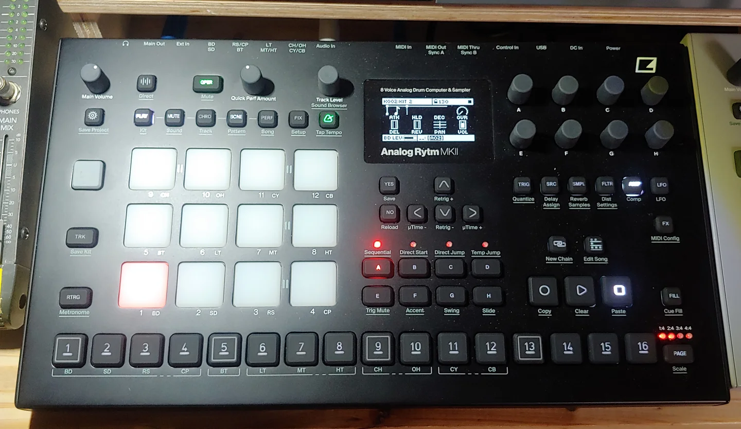 Elektron Analog Rytm MKII seen from above: twelve velocity pads, a small screen, parameter knobs and sixteen sequencer keys.