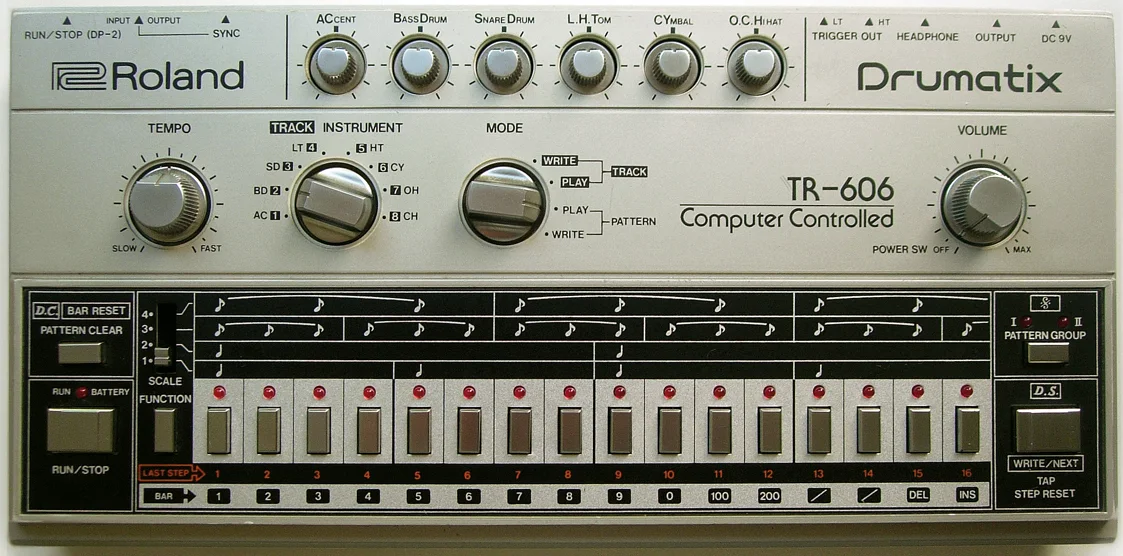 Front panel of a Roland TR-606 Drumatix: level knobs for accent, bass drum, snare, toms, cymbal and hi-hat along the top, tempo and mode dials in the middle, and sixteen step buttons with red LEDs along the bottom.